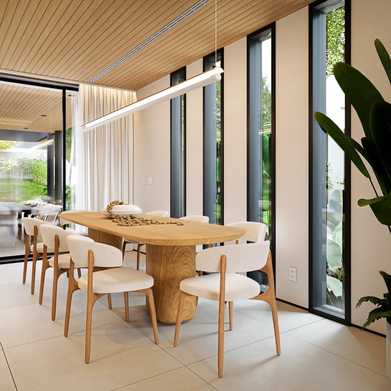 Sala de jantar com pé-direito e vidros altos